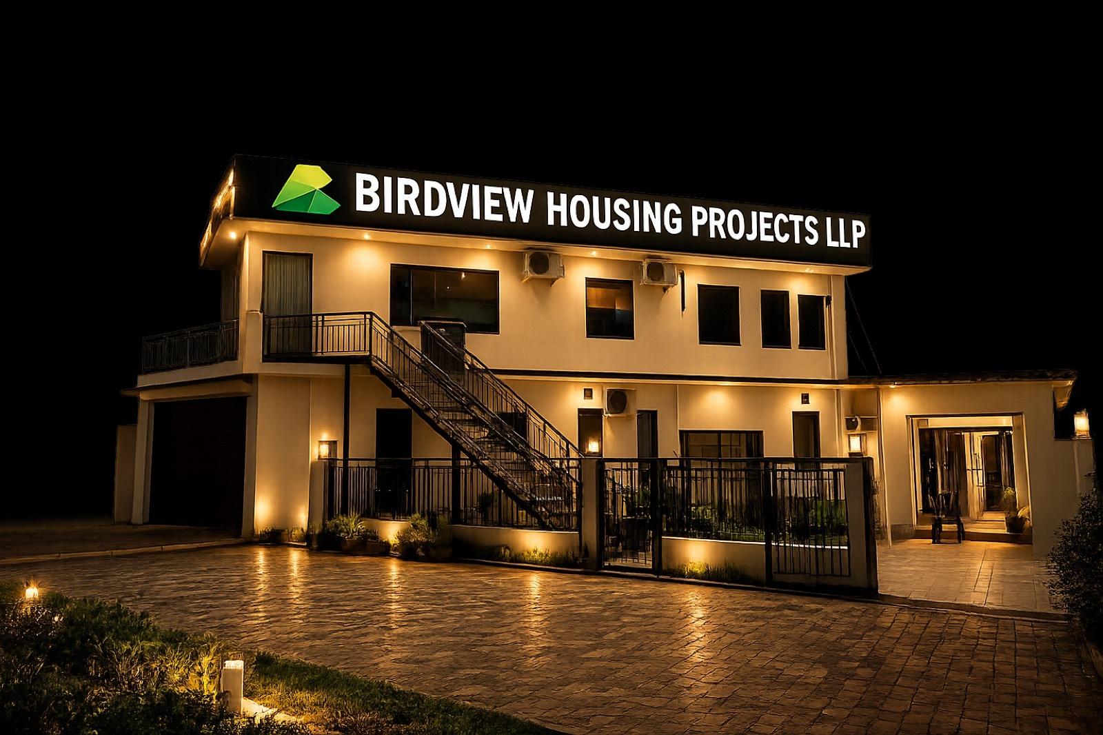The Birdview Housing Projects LLP office in Gurugram, lit at night