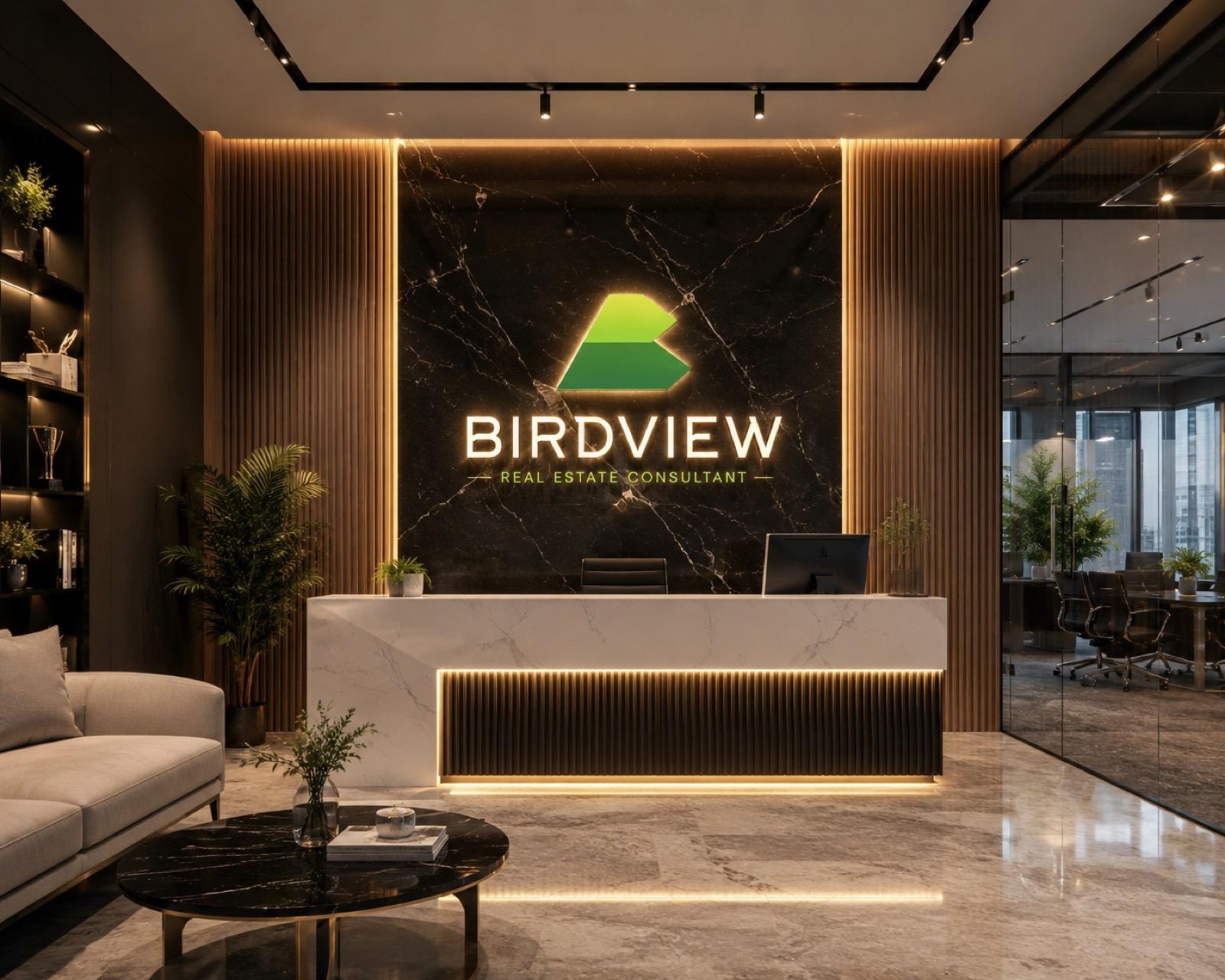 The Birdview Housing reception, with the company's signage behind the desk
